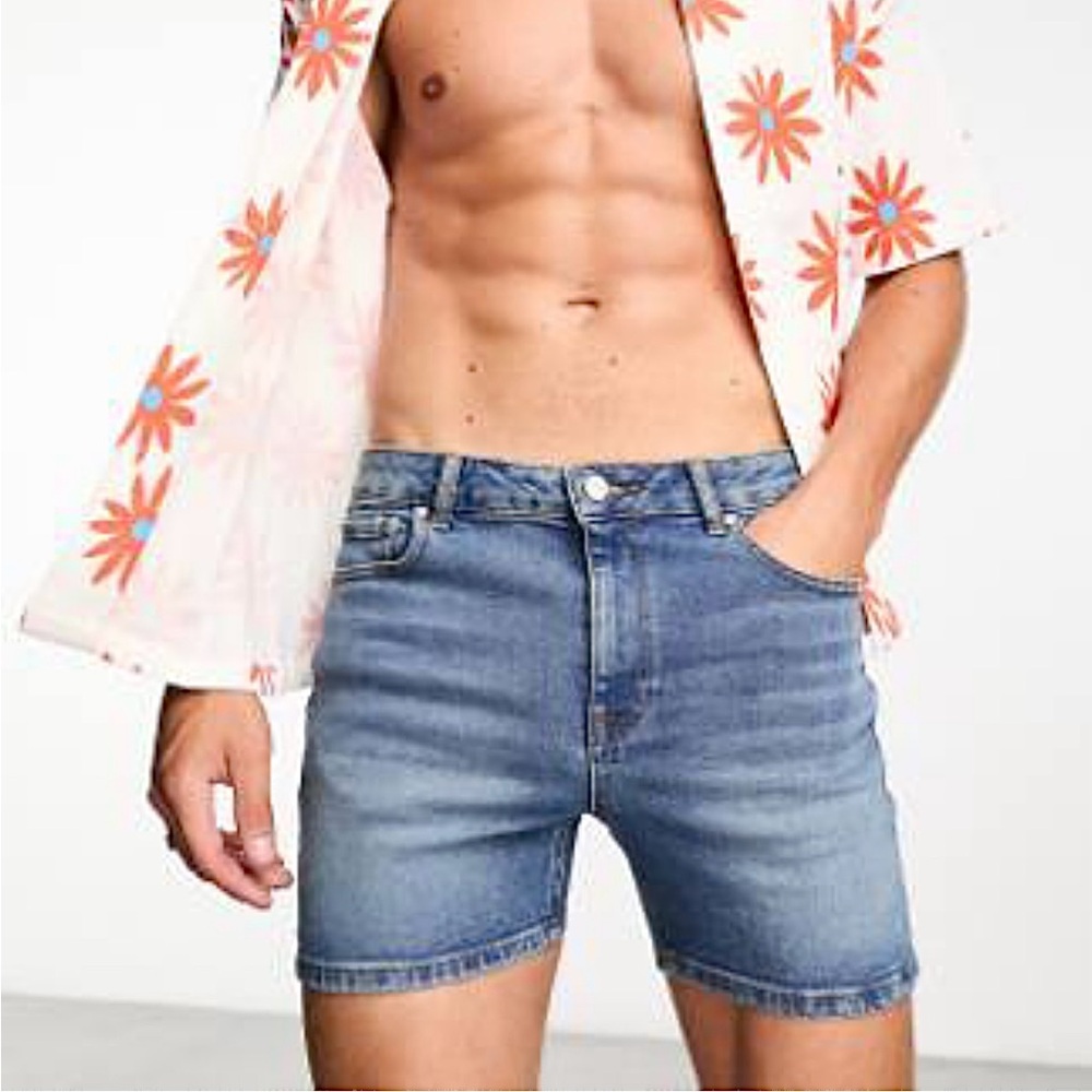 ASOS DESIGN skinny shorter length denim shorts.